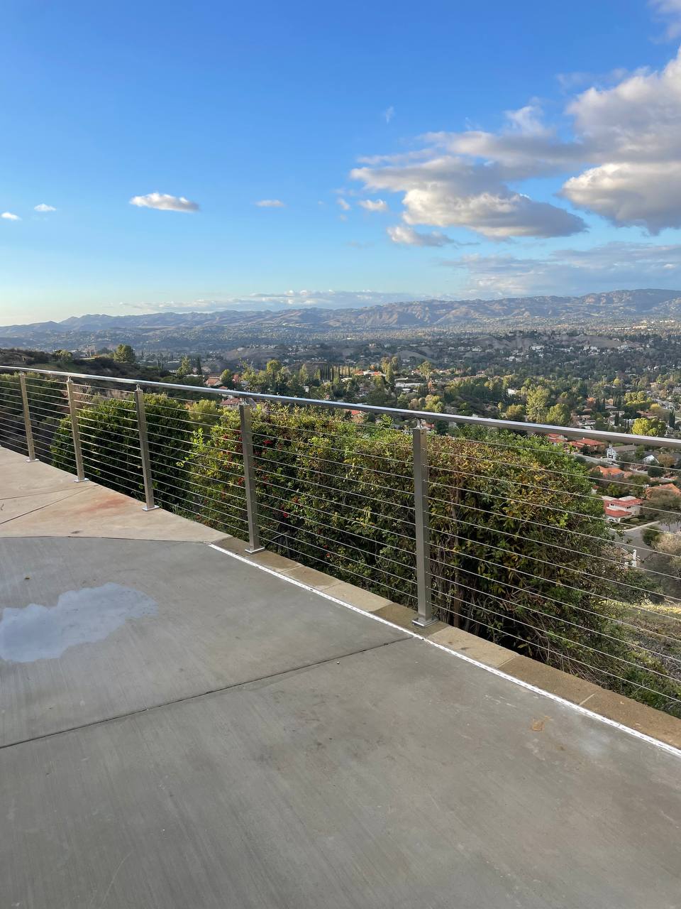 Stainless steel cable railing installation.