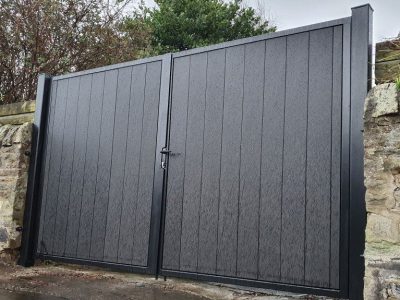 Black Double-Swing Gates With Vertical Slats